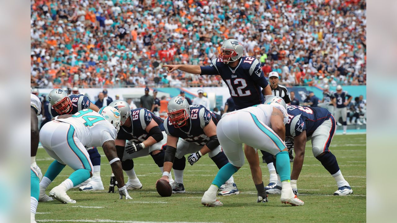 New England Patriots quarterback Tom Brady is sacked for a loss by Miami  Dolphins Koa Misi in second half action against the Miami Dolphins at Sun  Life Stadium in Miami on October