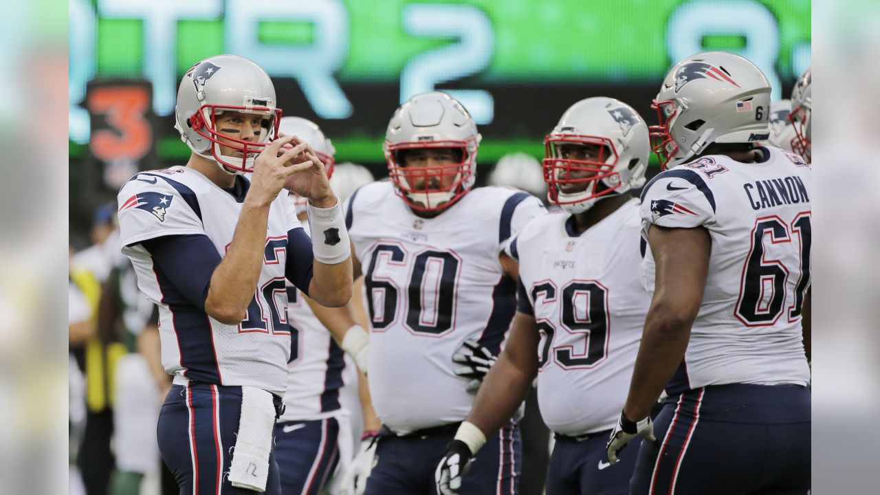 New England Patriots Tom Brady throws a pass in the first half against the  New York Jets in week 12 of the NFL at MetLife Stadium in East Rutherford,  New Jersey on