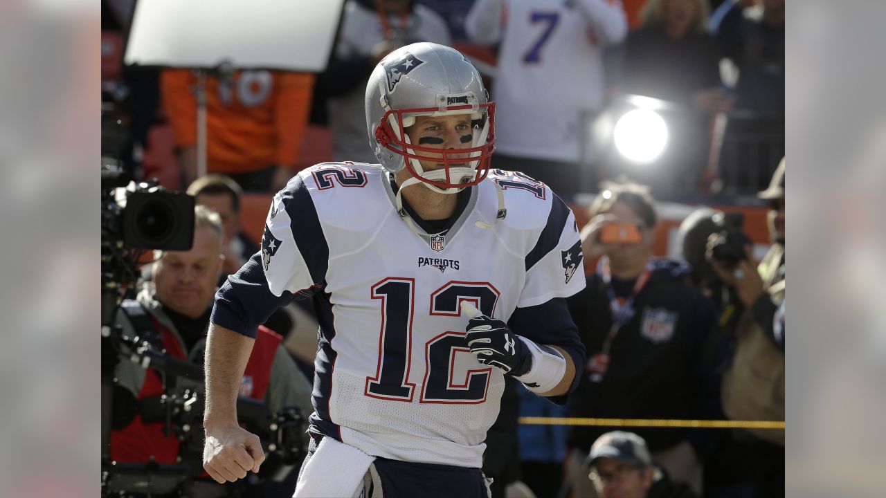 Denver Broncos Peyton Manning throws against the New England Patriots  during the AFC Championship game at Sport Authority Field at Mile High in  Denver on January 24, 2016. Denver advances to Super