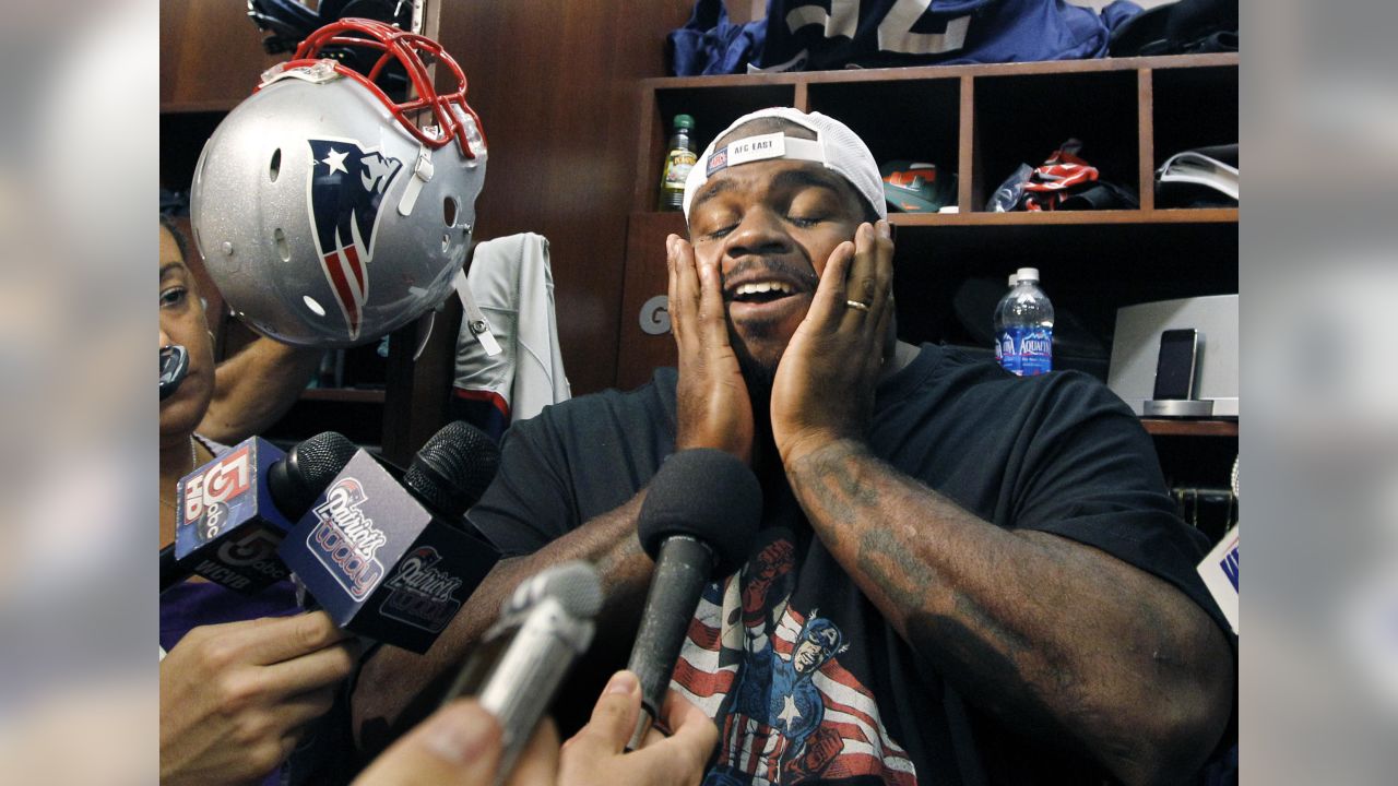 FOXBOROUGH, MA - SEPTEMBER 24: New England Patriots nose tackle Vince  Wilfork waves to the crowd during his induction into the New England Patriots  Hall of Fame presented by Raytheon Technologies on