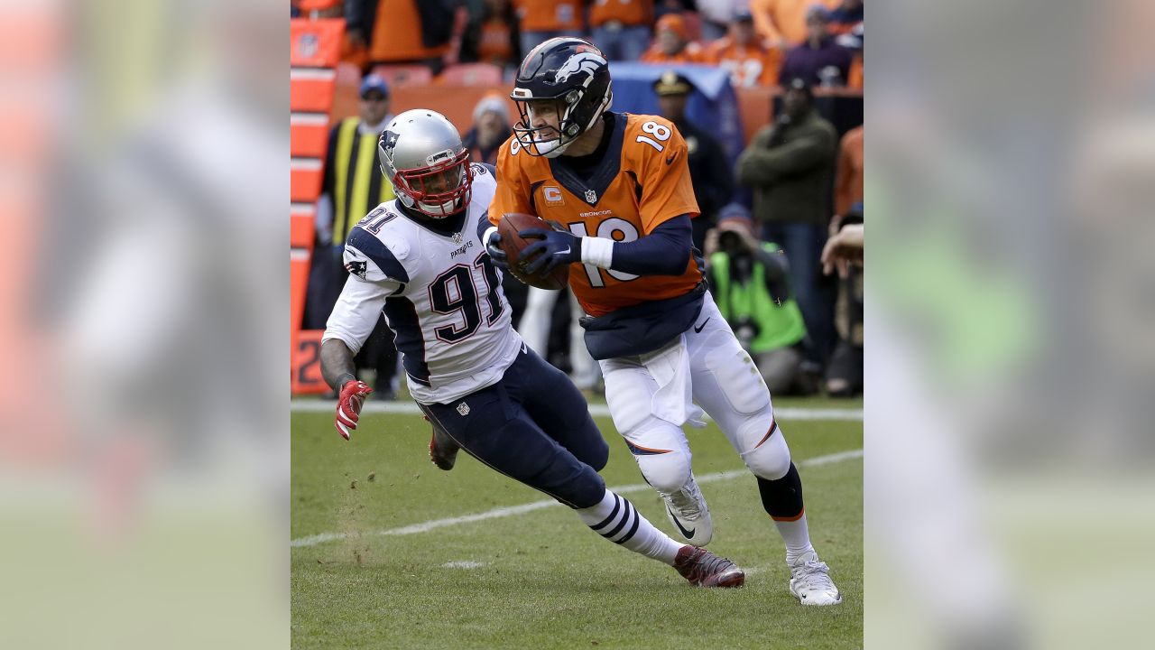 Denver Broncos tight end Owen Daniels and quarterback Peyton Manning  celebrate C.J. Anderson's two yard touchdown against the Carolina Panthers  in the fourth quarter of Super Bowl 50 in Santa Clara, California