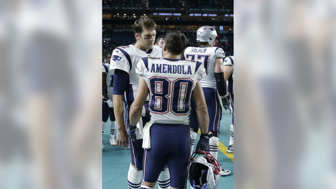 New England Patriots quarterback Tom Brady (12) passes against the Miami  Dolphins November 13, 2005 at