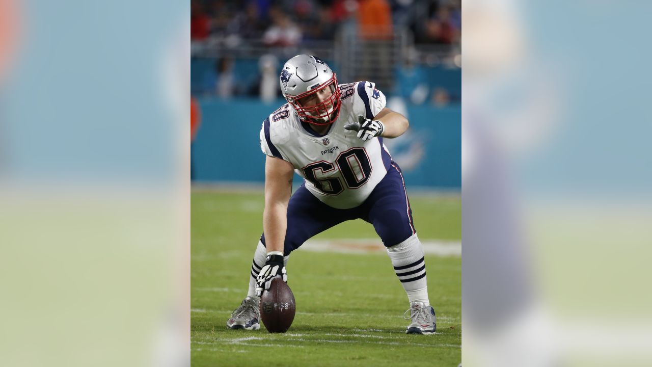 New England Patriots center David Andrews (60) congratulates