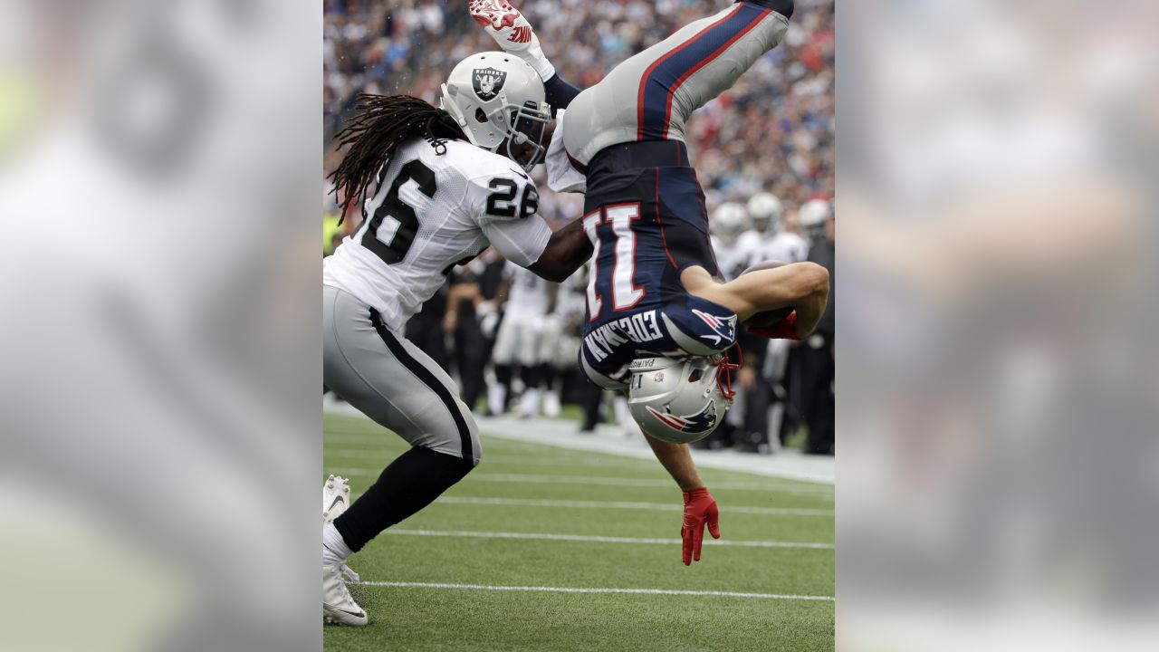 October 20, 2013: New England Patriots wide receiver Julian Edelman (11)  looks on with his helmet off during warm-ups prior to the NFL game between  the New England Patriots and the New