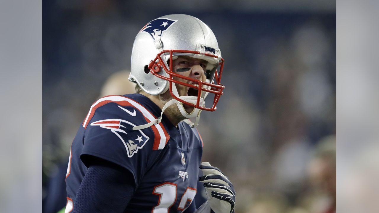 New England Patriots quarterback Tom Brady (12) quarterback Jimmy Garoppolo  (10) while warming up before the game against the Atlanta Falcons at  Gillette Stadium in Foxborough, Massachusetts on October 22, 2017. Photo