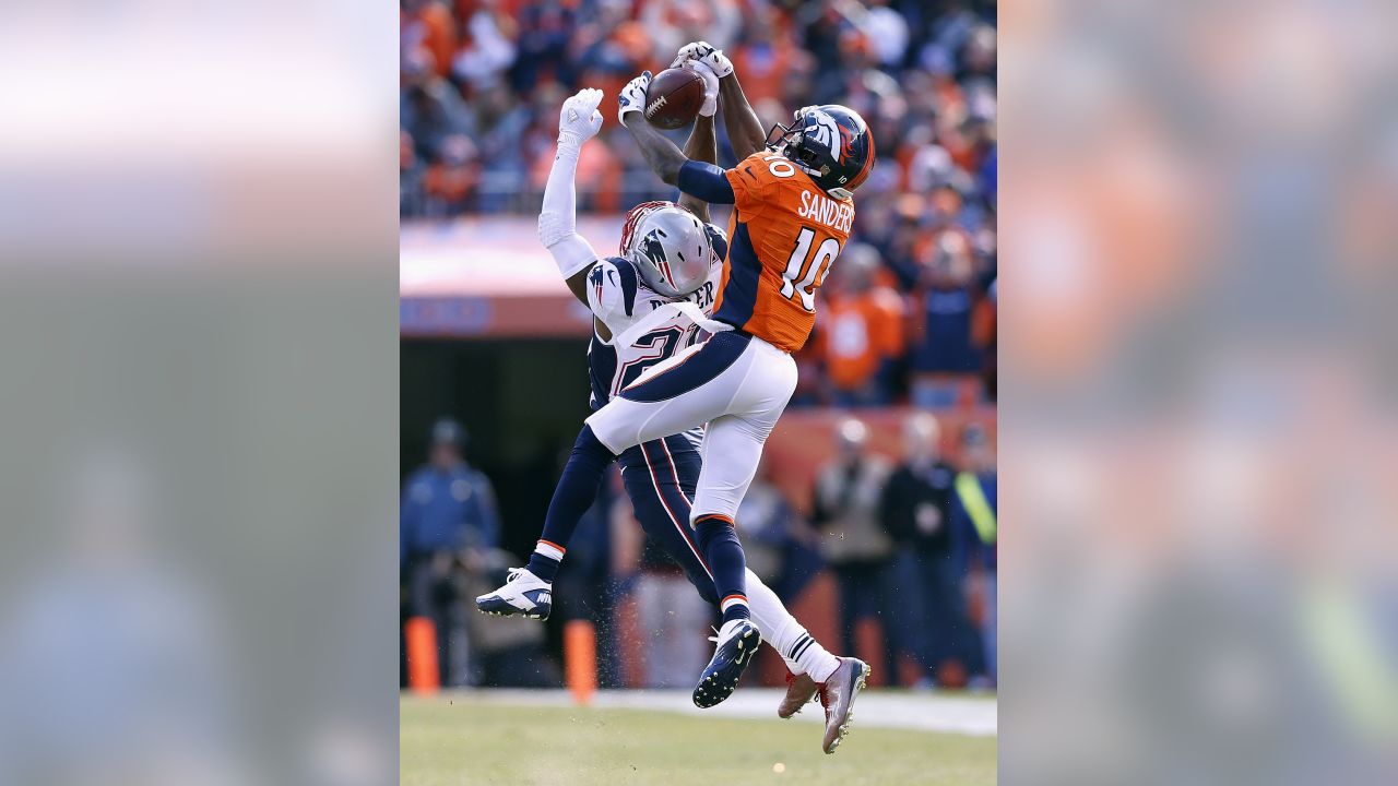 Denver Broncos wide receiver Demaryius Thomas (88) and running back C.J.  Anderson (22) celebrate after Thomas made a touchdown catch in the first  half of an NFL football game against the Pittsburgh