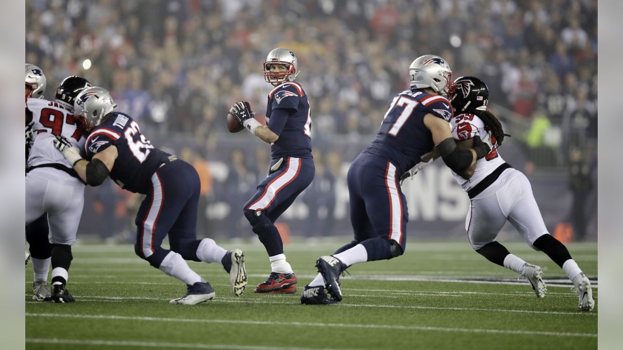 Tampa Bay Buccaneers quarterback Tom Brady (12) puts on his helmet during  the second half of an NFL football game against the New England Patriots,  Sunday, Oct. 3, 2021, in Foxborough, Mass. (