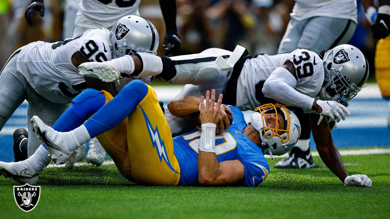 Las Vegas Raiders defensive tackle Bilal Nichols (91) reacts after a  touchdown against the Los Angeles Chargers during the first half of an NFL  football game, Sunday, Dec. 4, 2022, in Las