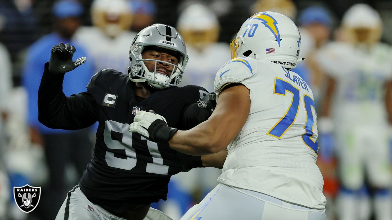 Los Angeles Chargers wide receiver Tyron Johnson (83) is defended