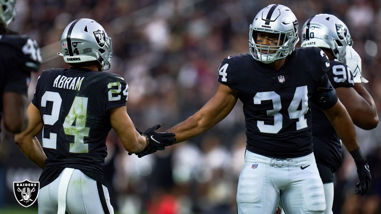 Las Vegas Raiders guard Jordan Simmons (60) looks out from the