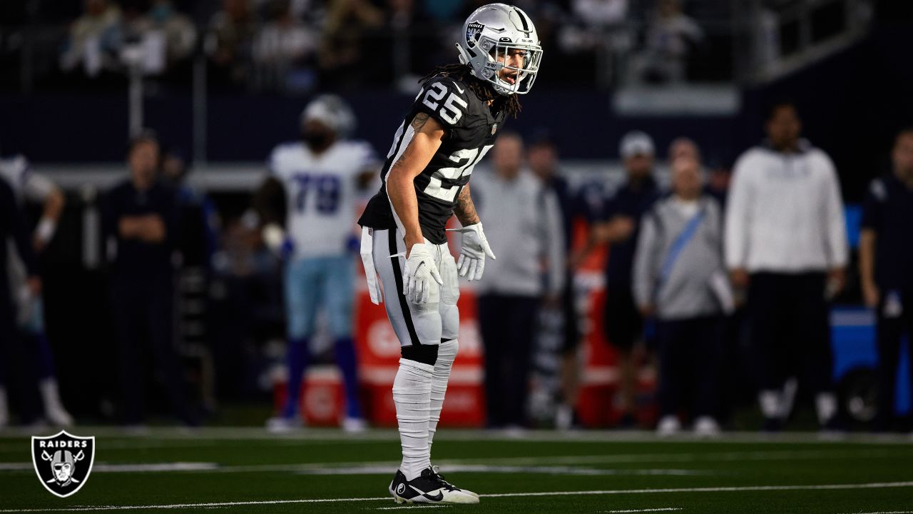 Las Vegas Raiders quarterback Aidan O'Connell (4) gestures as he warms up  before the first half of a preseason NFL football game against the Dallas  Cowboys in Arlington, Texas, Saturday, Aug. 26