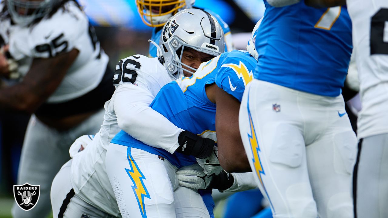 Las Vegas Raiders defensive end Isaac Rochell (96) walks off the