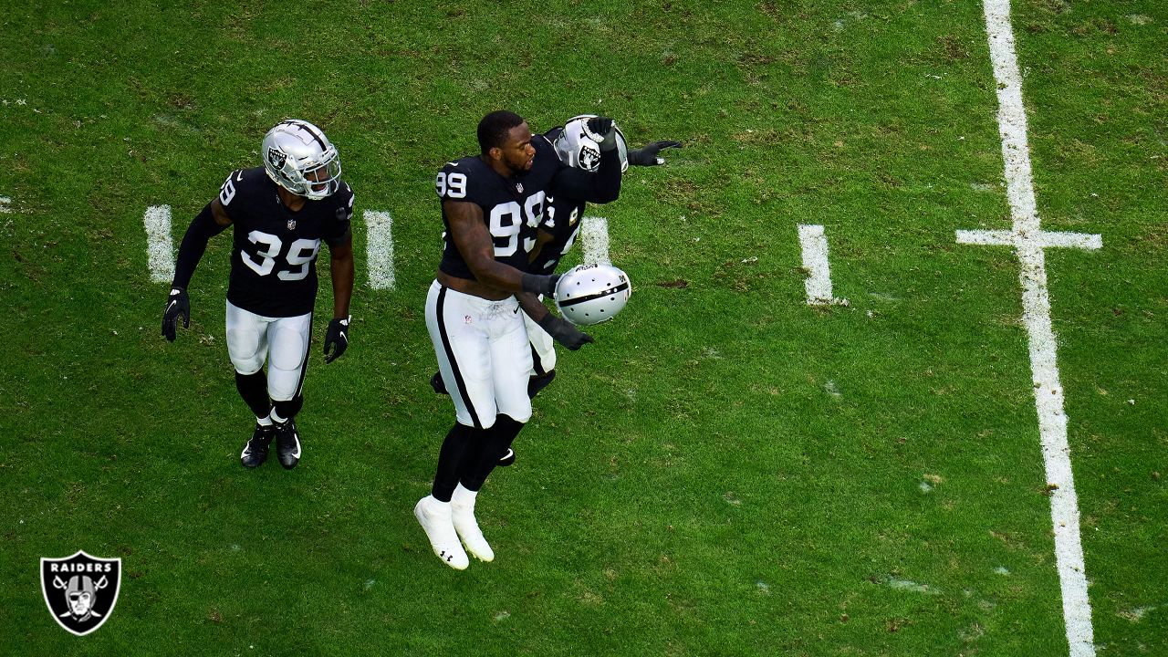 Raiders defensive end Clelin Ferrell (99) celebrates a sack with Raiders  defensive end Solomon …