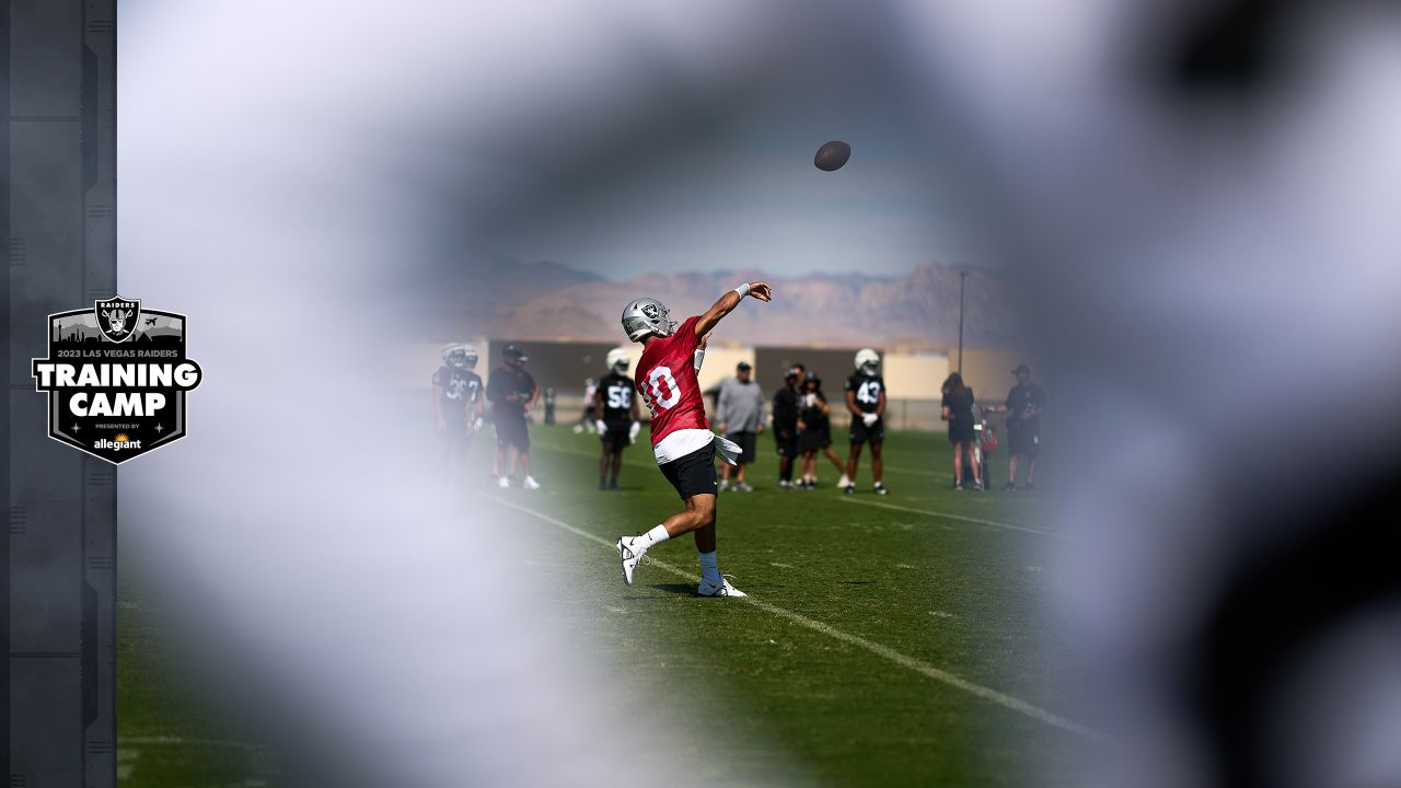 Las Vegas Raiders safety Jaquan Johnson (26) is seen during warm ups before  an NFL preseason football game against the Dallas Cowboys, Saturday, Aug.  26, 2023, in Arlington, Texas. Dallas won 31-16. (