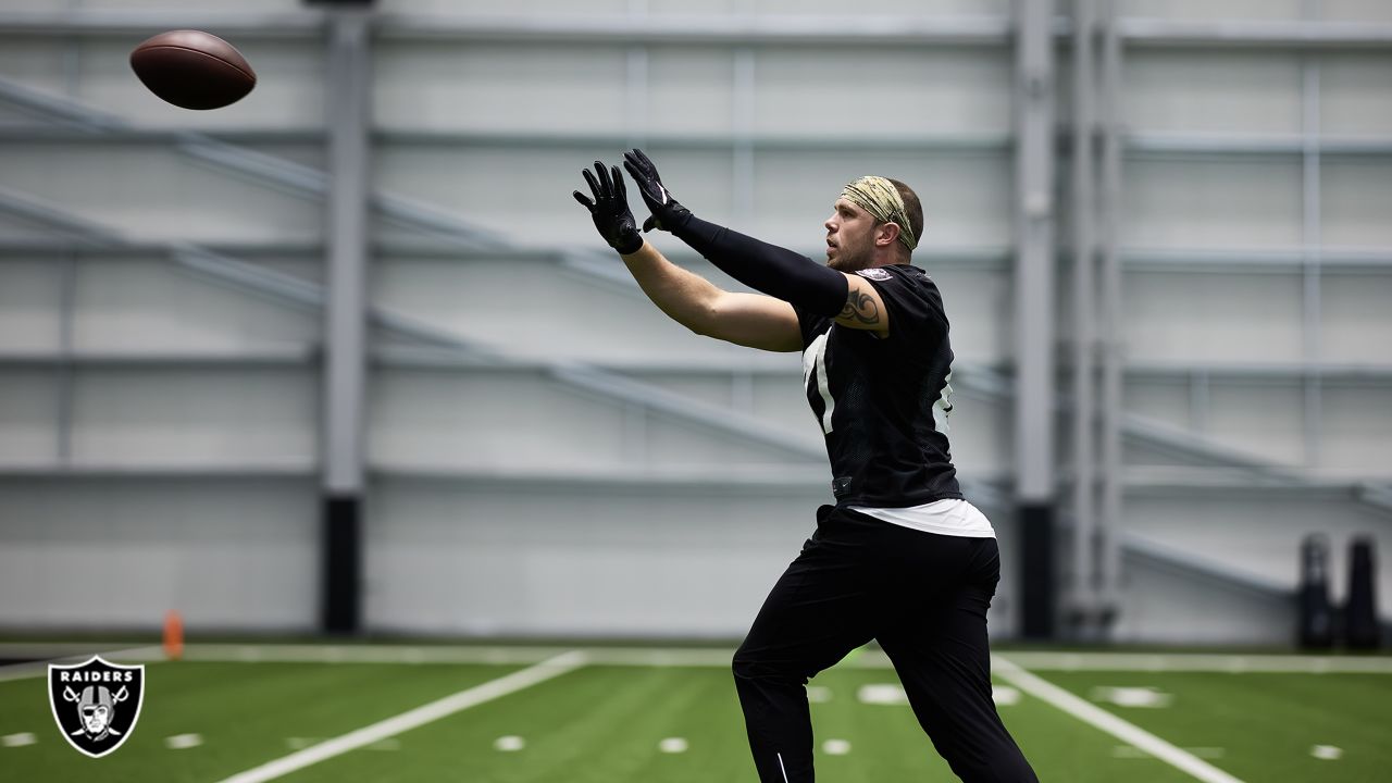 Las Vegas Raiders quarterback Chase Garbers (15) throws the ball on the  field before an NFL