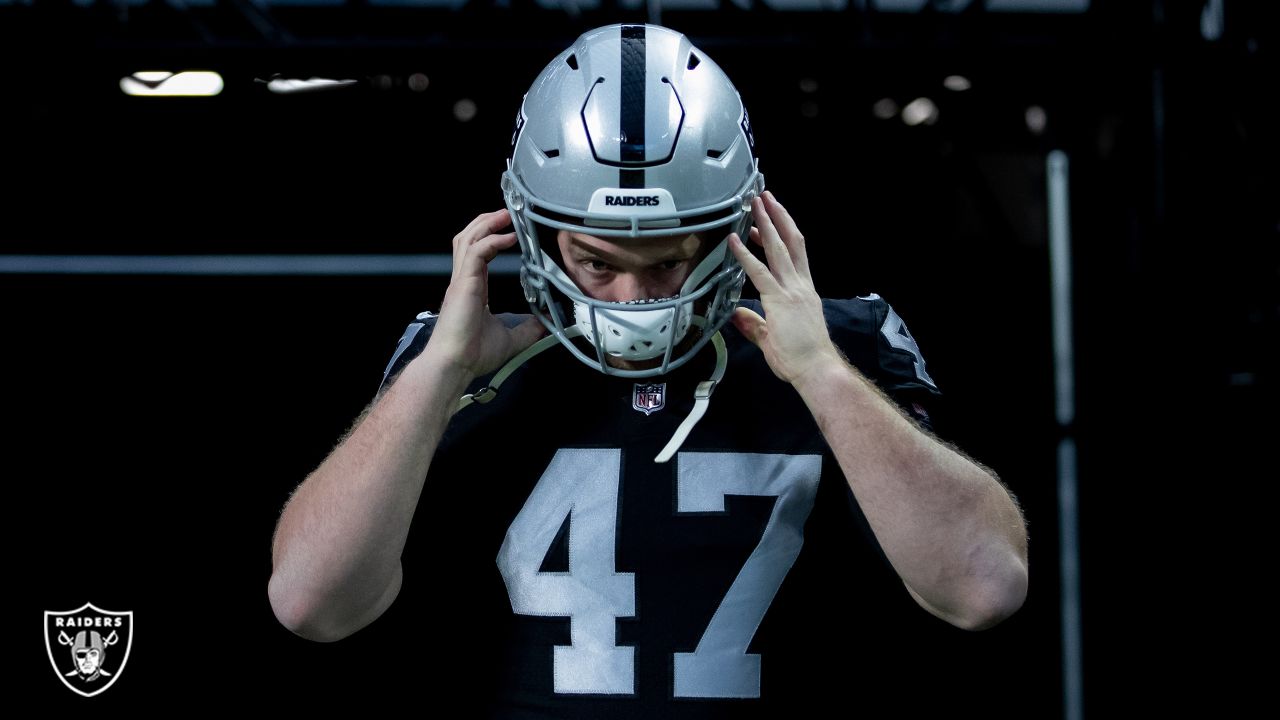 Las Vegas Raiders' Trent Sieg warms up at the NFL football team's