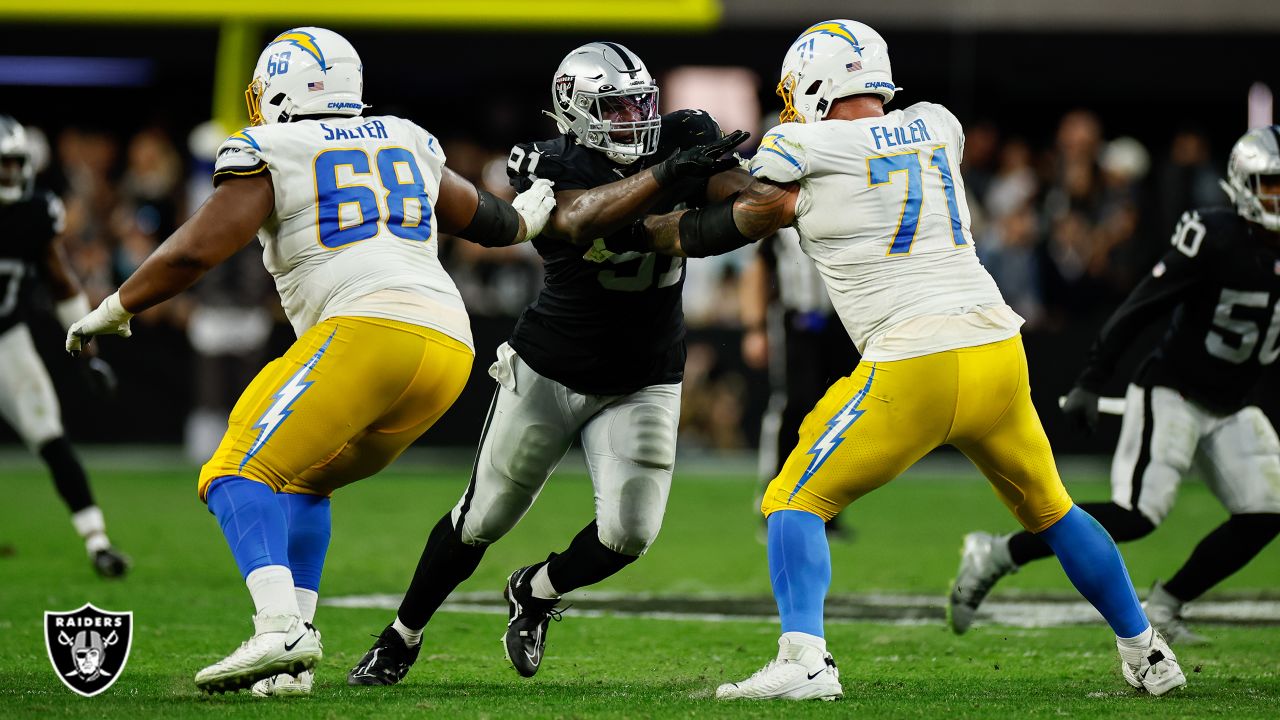 Las Vegas Raiders defensive tackle Bilal Nichols (91) reacts after a  touchdown against the Los Angeles Chargers during the first half of an NFL  football game, Sunday, Dec. 4, 2022, in Las