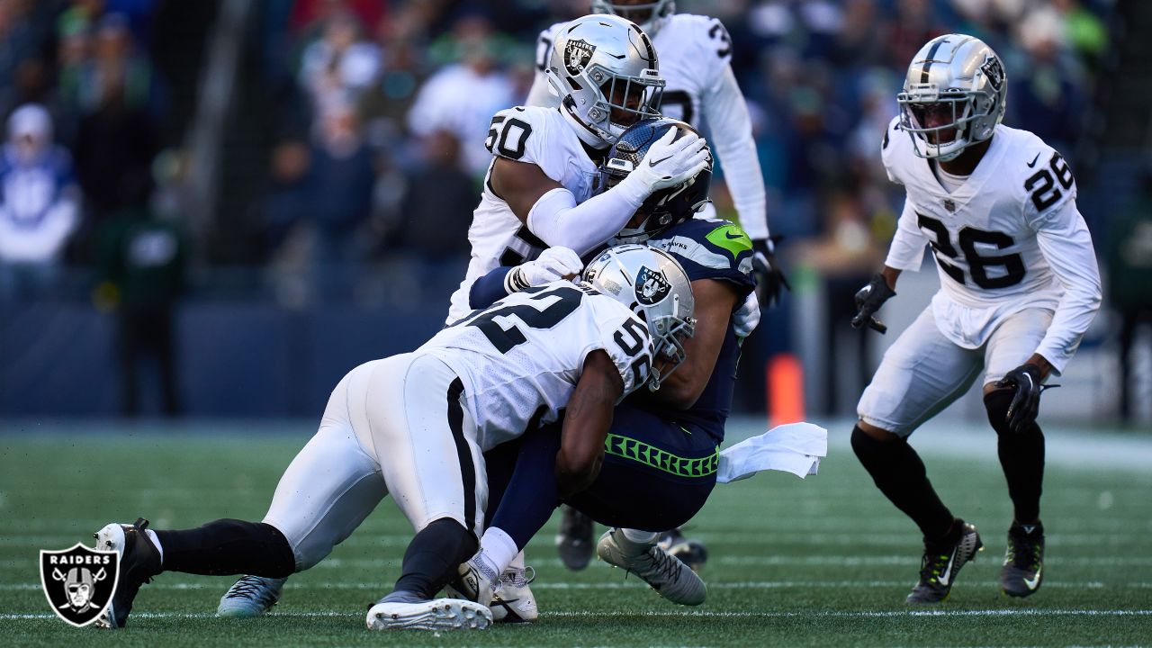 Las Vegas Raiders safety Duron Harmon celebrates his interception with  defensive end Maxx Crosby during an NFL football game against the Seattle  Seahawks, Sunday, Nov. 27, 2022, in Seattle.The Raiders won 40-34