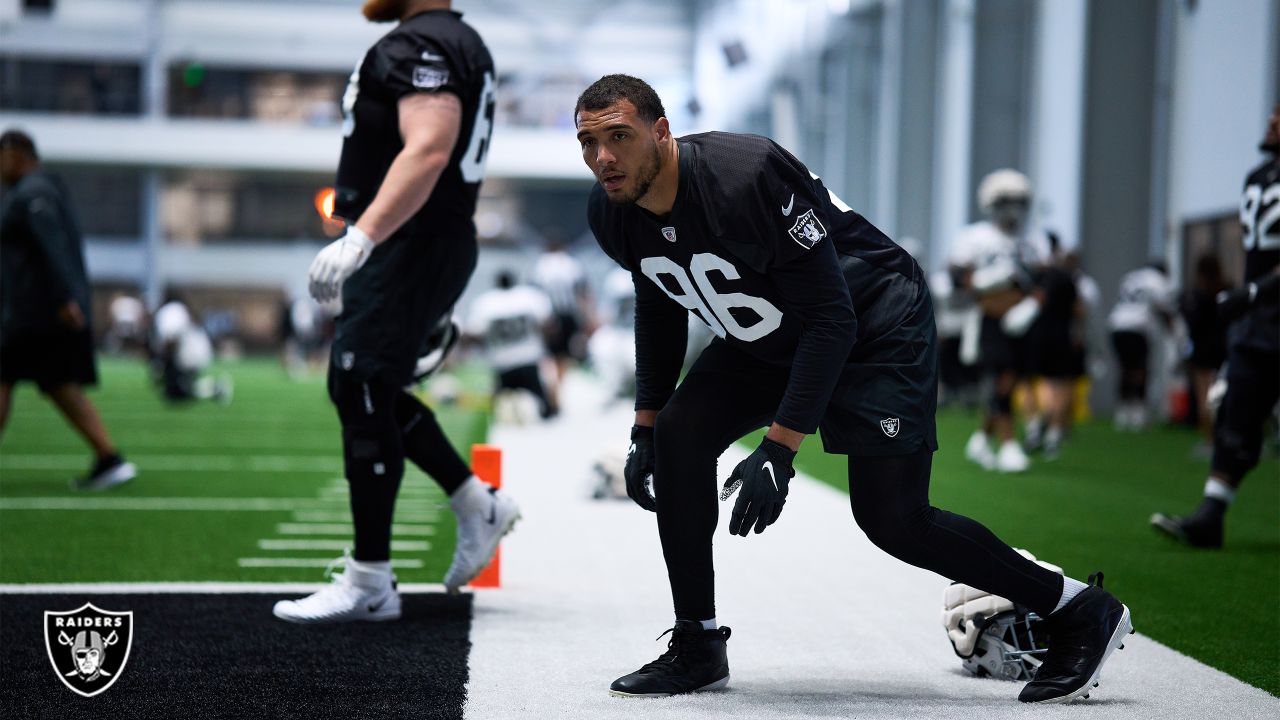 Las Vegas Raiders defensive end Tashawn Bower (96) takes a break