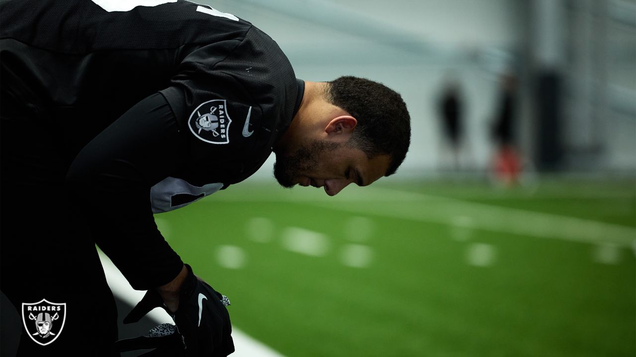 Las Vegas Raiders defensive end Tashawn Bower (96) takes a break