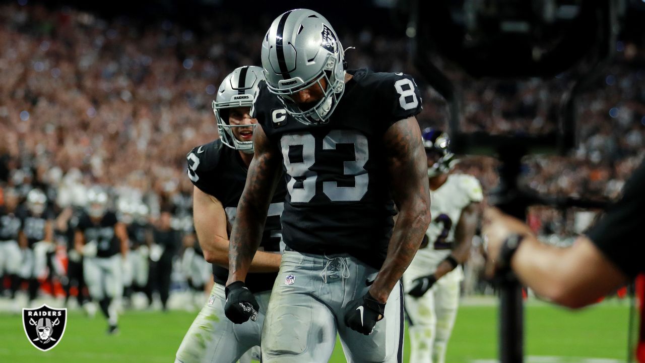 Darren Waller of the Las Vegas Raiders celebrates a touchdown with