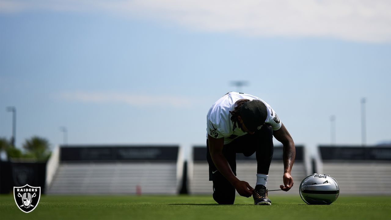 Las Vegas Raiders safety Isaiah Pola-Mao (20) is seen during warm ups  before an NFL preseason football game against the Dallas Cowboys, Saturday,  Aug. 26, 2023, in Arlington, Texas. Dallas won 31-16. (