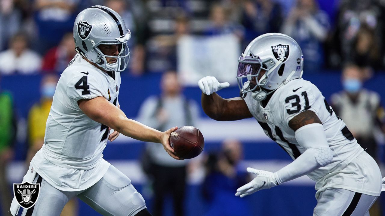 January 02, 2022: Las Vegas Raiders quarterback Marcus Mariota (8) runs  with the ball during NFL football game action between the Las Vegas Raiders  and the Indianapolis Colts at Lucas Oil Stadium