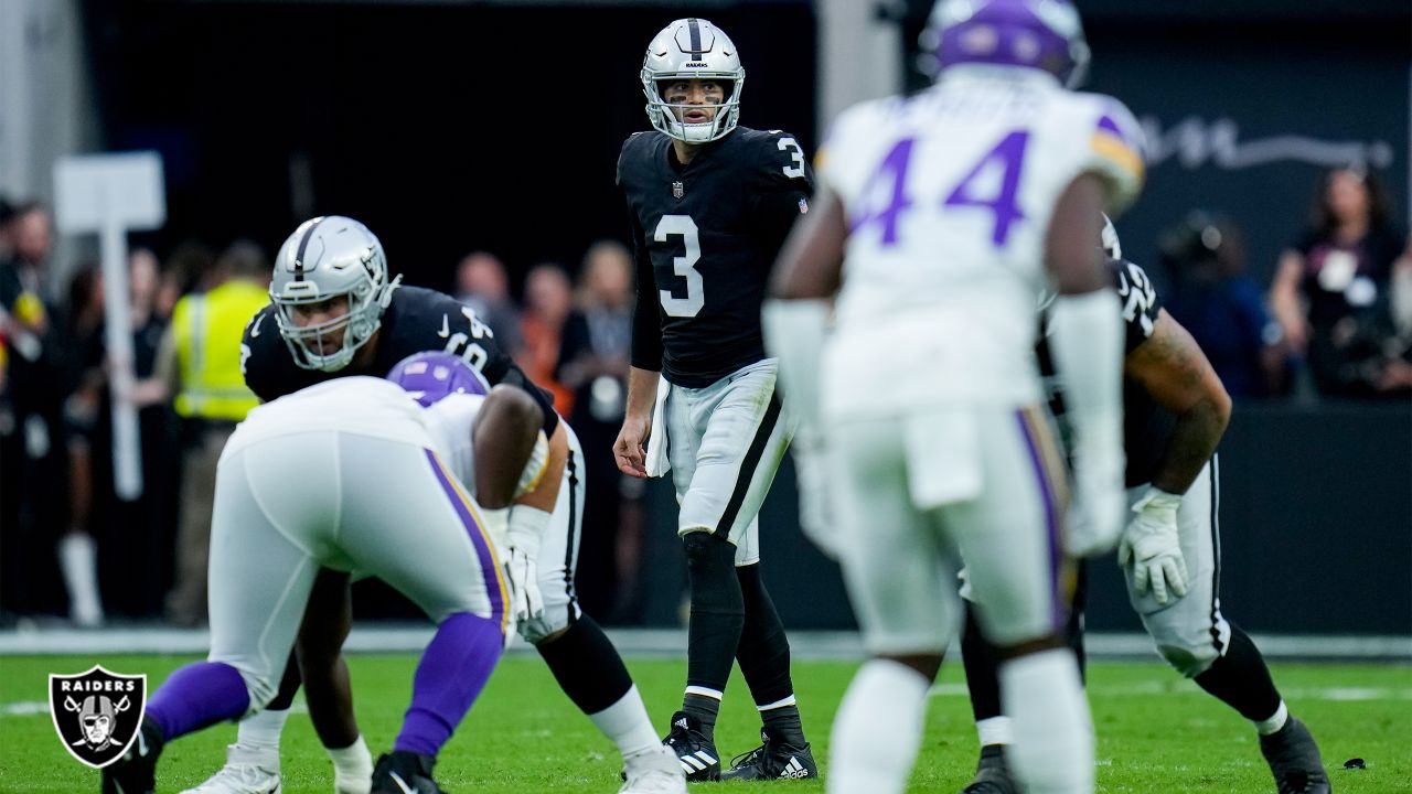 Minnesota Vikings linebacker Luiji Vilain jumps over Las Vegas Raiders  quarterback Jarrett Stidham during the first half of an NFL preseason  football game, Sunday, Aug. 14, 2022, in Las Vegas. (AP Photo/Rick