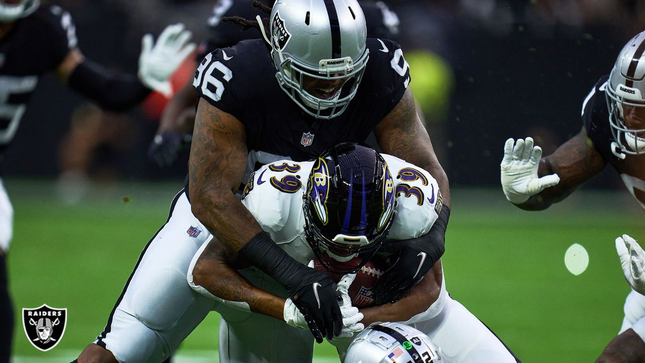 Las Vegas Raiders guard Jordan Simmons (60) looks out from the