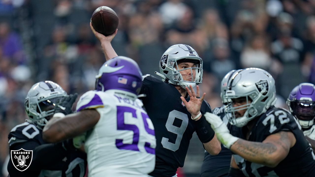 Las Vegas Raiders quarterback Jarrett Stidham is tackled by Minnesota  Vikings defensive tackle T.Y. McGill during the first half of an NFL  preseason football game, Sunday, Aug. 14, 2022, in Las Vegas. (