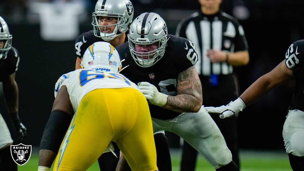 Los Angeles Chargers tight end Tre' McKitty (88) is tackled by Las Vegas  Raiders cornerback Nate Hobbs (39) during the first half of an NFL football  game, Sunday, Dec. 4, 2022, in