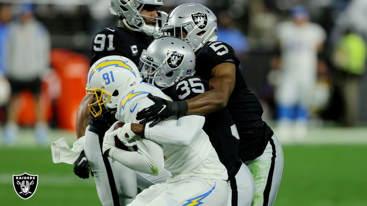 Las Vegas Raiders' Tyron Johnson (17) runs against the Los Angeles Chargers  during the first half of an NFL football game, Sunday, Jan. 9, 2022, in Las  Vegas. (AP Photo/Ellen Schmidt Stock