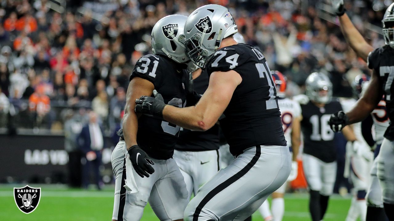 Las Vegas Raiders running back Peyton Barber (31) is tackled by