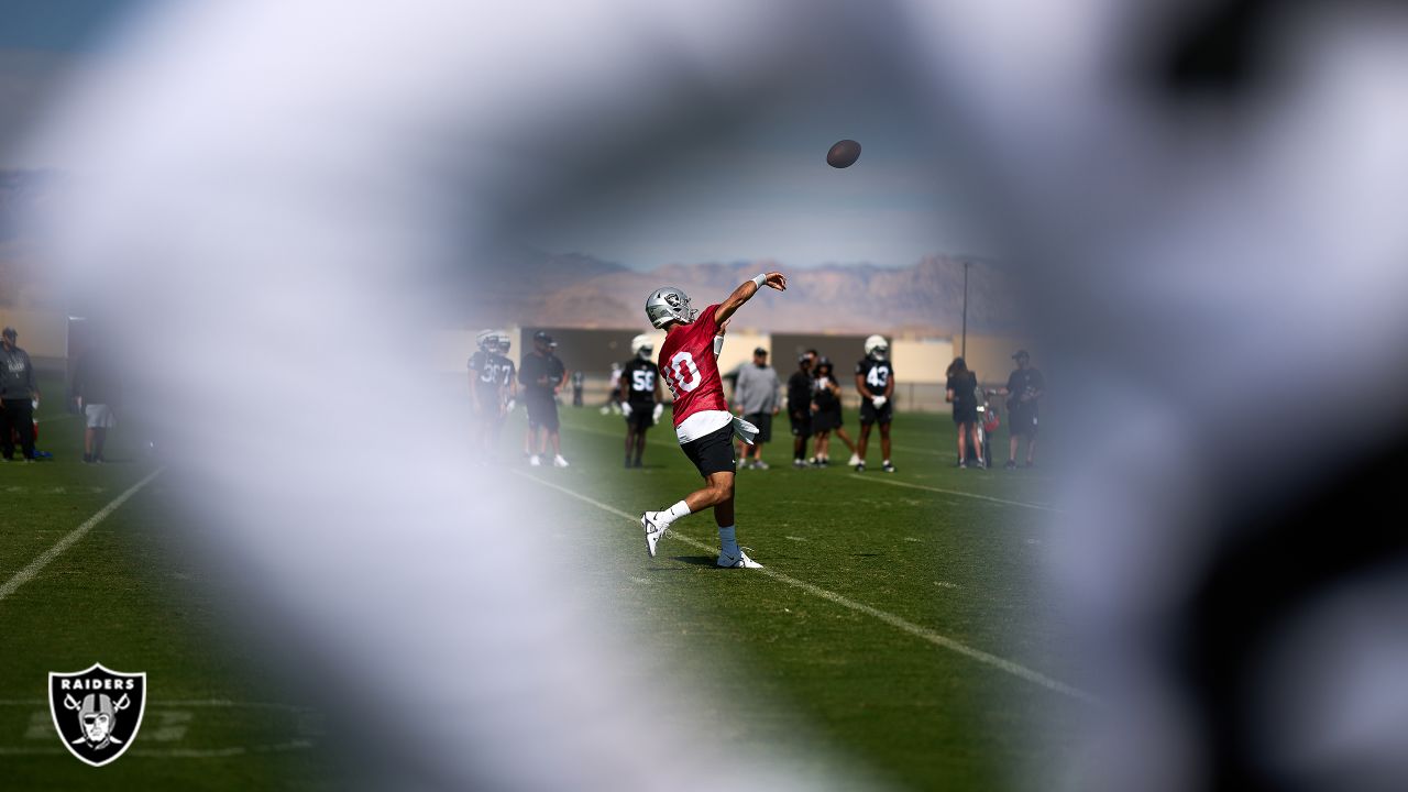 Las Vegas Raiders safety Jaquan Johnson (26) is seen during warm ups before  an NFL preseason football game against the Dallas Cowboys, Saturday, Aug.  26, 2023, in Arlington, Texas. Dallas won 31-16. (