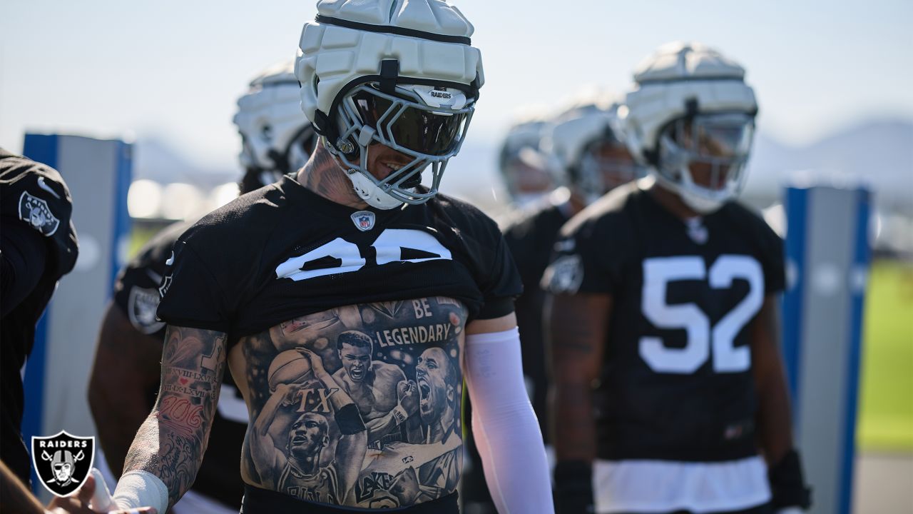 Oakland Raiders defensive end Maxx Crosby (98) on the bench during