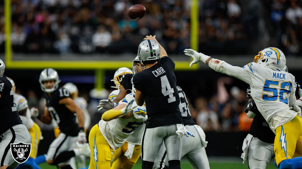 Los Angeles Chargers tight end Tre' McKitty (88) is tackled by Las Vegas  Raiders cornerback Nate Hobbs (39) during the first half of an NFL football  game, Sunday, Dec. 4, 2022, in