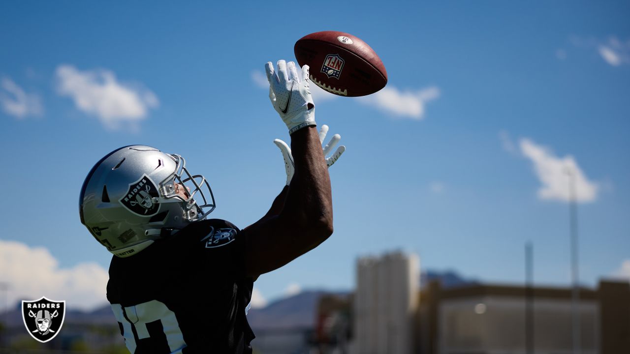 Las Vegas Raiders cornerback Amik Robertson (21) heads to the field before  an NFL football game against the Jacksonville Jaguars, Sunday, Nov. 6,  2022, in Jacksonville, Fla. (AP Photo/Phelan M. Ebenhack Stock