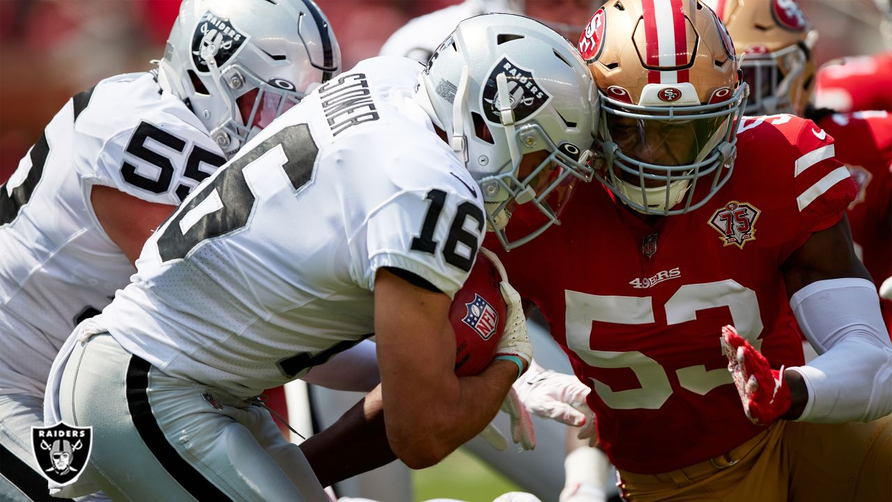 Las Vegas Raiders' Dillon Stoner (16) runs against San Francisco 49ers'  Elijah Mitchell an NFL …