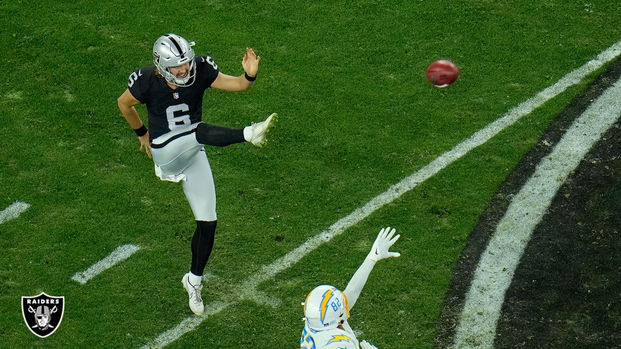 Las Vegas Raiders wide receiver Tyron Johnson (1) runs with the ball during  an NFL football game against the Miami Dolphins, Saturday, Aug. 20, 2022,  in Miami Gardens, Fla. (AP Photo/Doug Murray