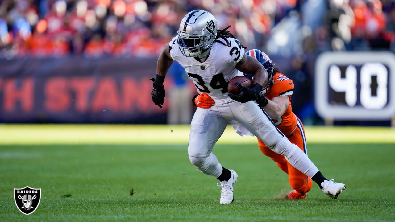 PHOTOS: Broncos take on Raiders in regular season opener in Oakland