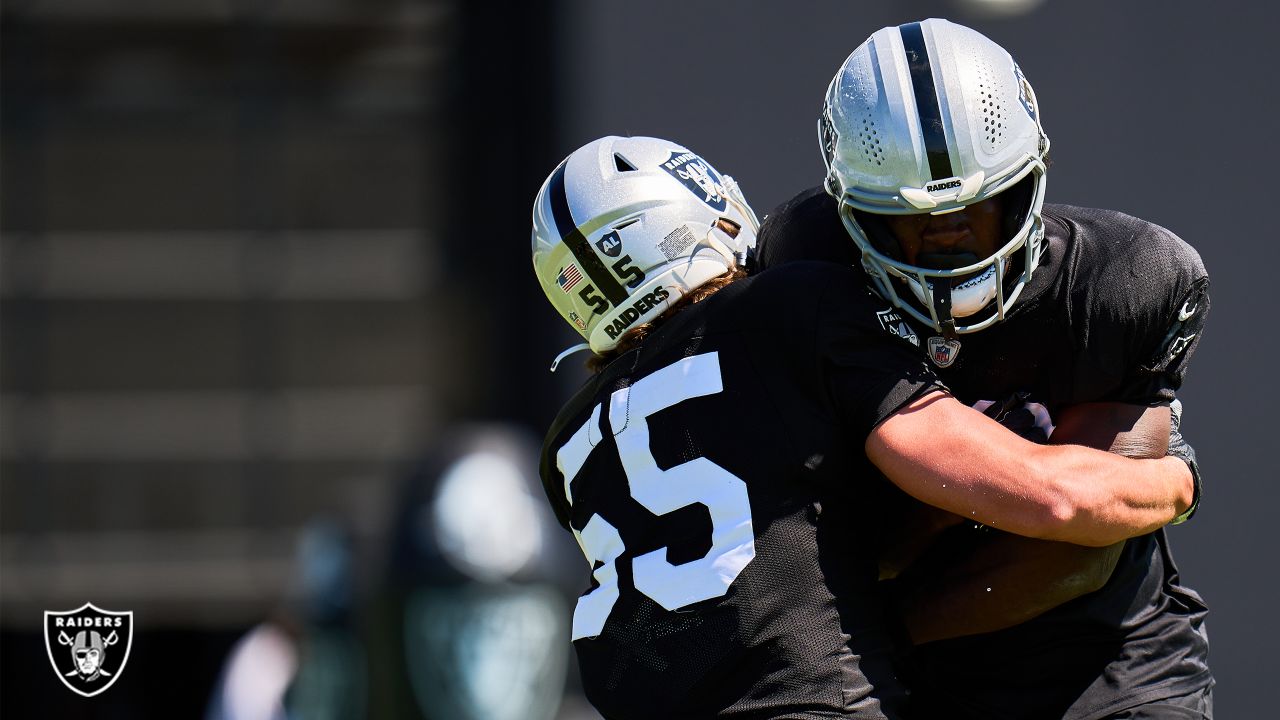 Raiders linebacker Tanner Muse (55) runs through drills during NFL football  practice at Raiders …