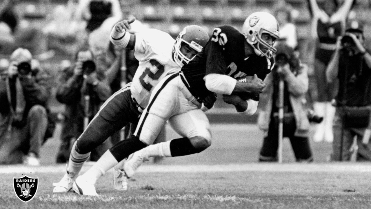 Las Vegas Raiders running back Josh Jacobs (28) as Kansas City Chiefs  safety Juan Thornhill (22) defends during the second half of an NFL football  game Saturday, Jan. 7, 2023, in Las