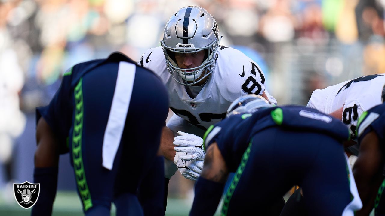 Las Vegas Raiders cornerback Amik Robertson (21) tackles Seattle Seahawks  tight end Cam Sutton (46) during the second half of an NFL preseason  football game, Saturday, Aug. 14, 2021, in Las Vegas. (