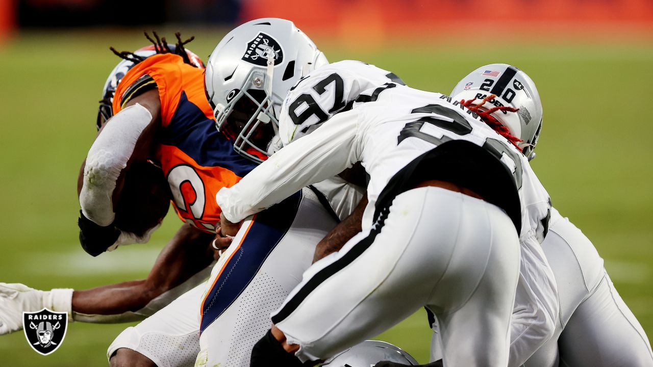 Las Vegas Raiders defensive tackle Maliek Collins (97) puts