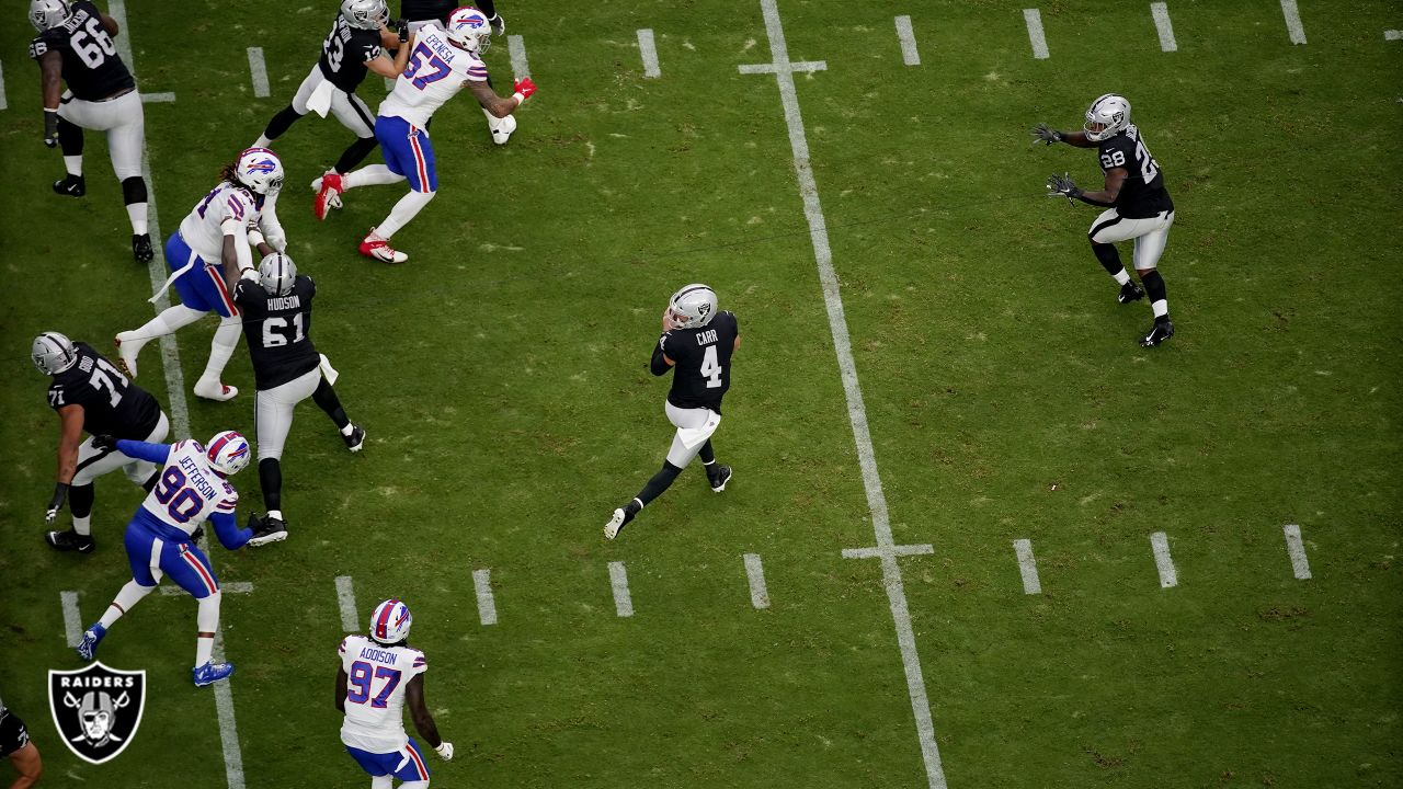 Las Vegas Raiders defensive tackle Maliek Collins (97) stretches