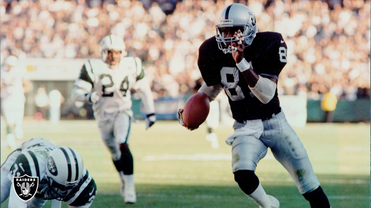 Oakland Raiders Chris Johnson (37) runs back his interception in the third  quarter of the Oakland Raiders and Kansas City Chiefs game at the  Oakland-Alameda County Coliseum in Oakland, Calif. on Sunday