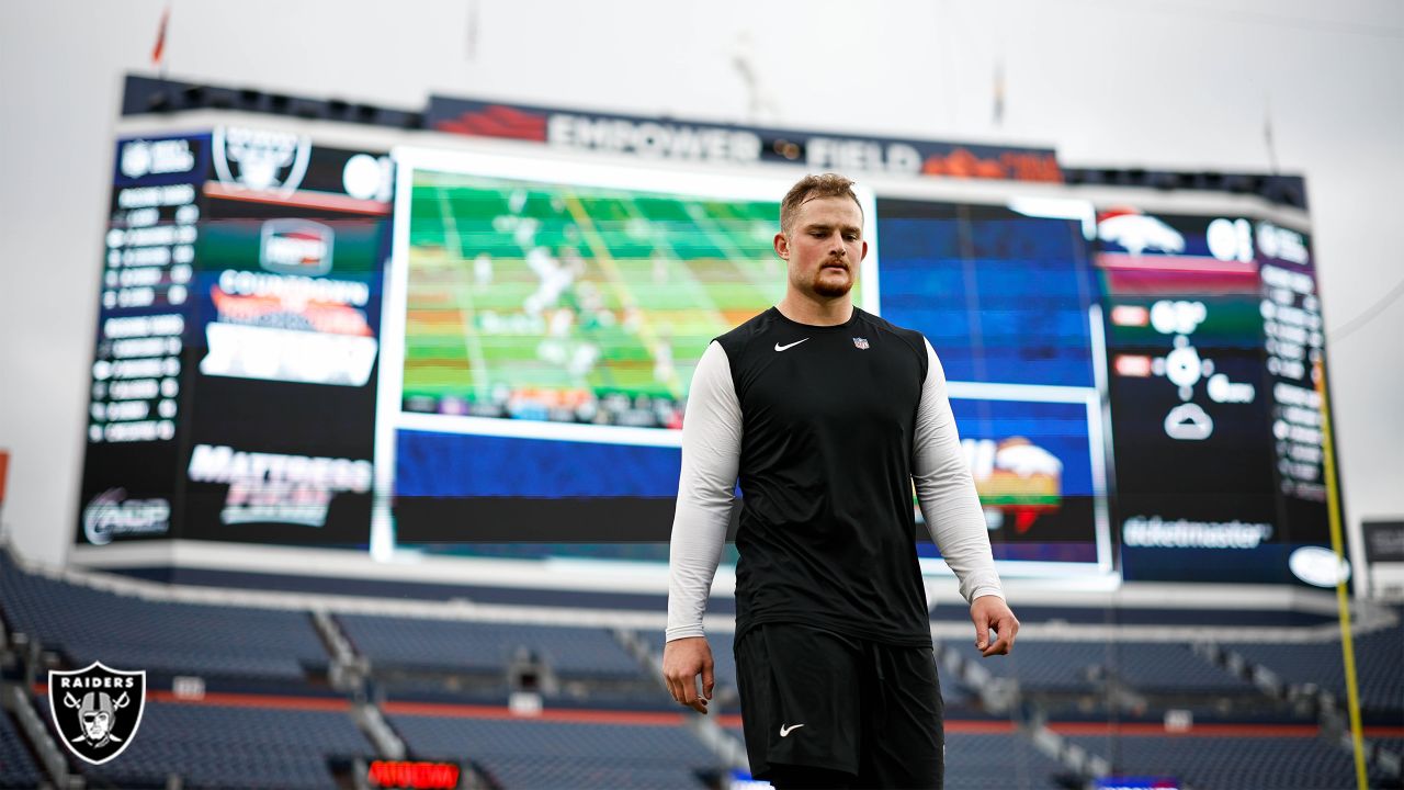 Denver Broncos long snapper Jacob Bobenmoyer walks off the field