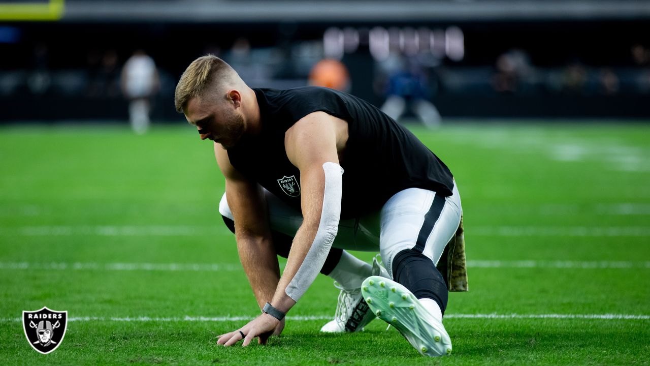 Las Vegas Raiders cornerback Sam Webb (27) warms up before playing