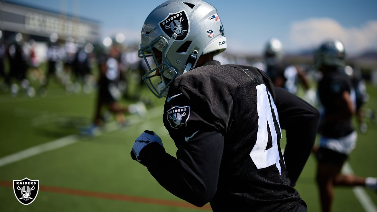 Las Vegas Raiders cornerback Amik Robertson walks to the field to warm up  before an NFL football game against the Jacksonville Jaguars, Sunday, Nov.  6, 2022, in Jacksonville, Fla. (AP Photo/Phelan M.