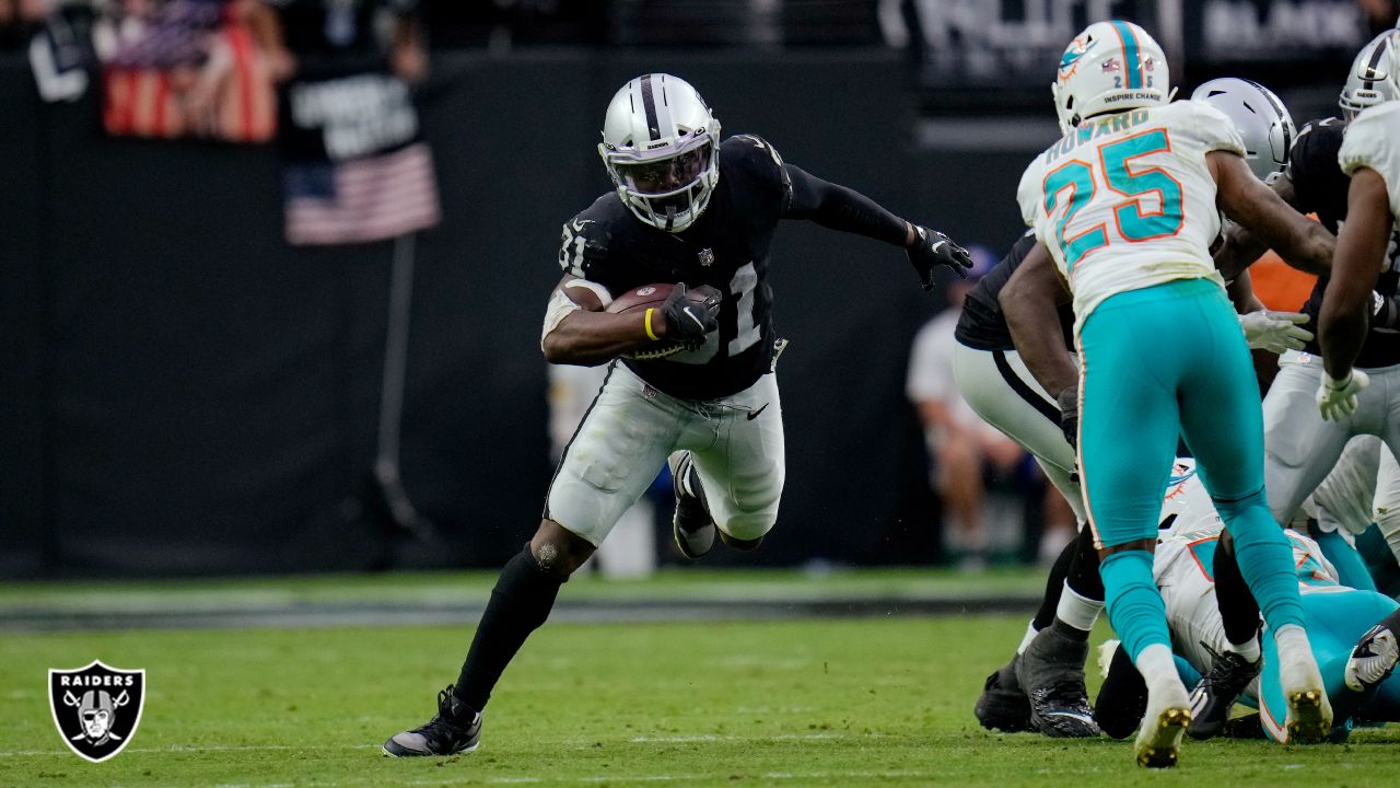 Las Vegas Raiders running back Peyton Barber (31) is tackled by